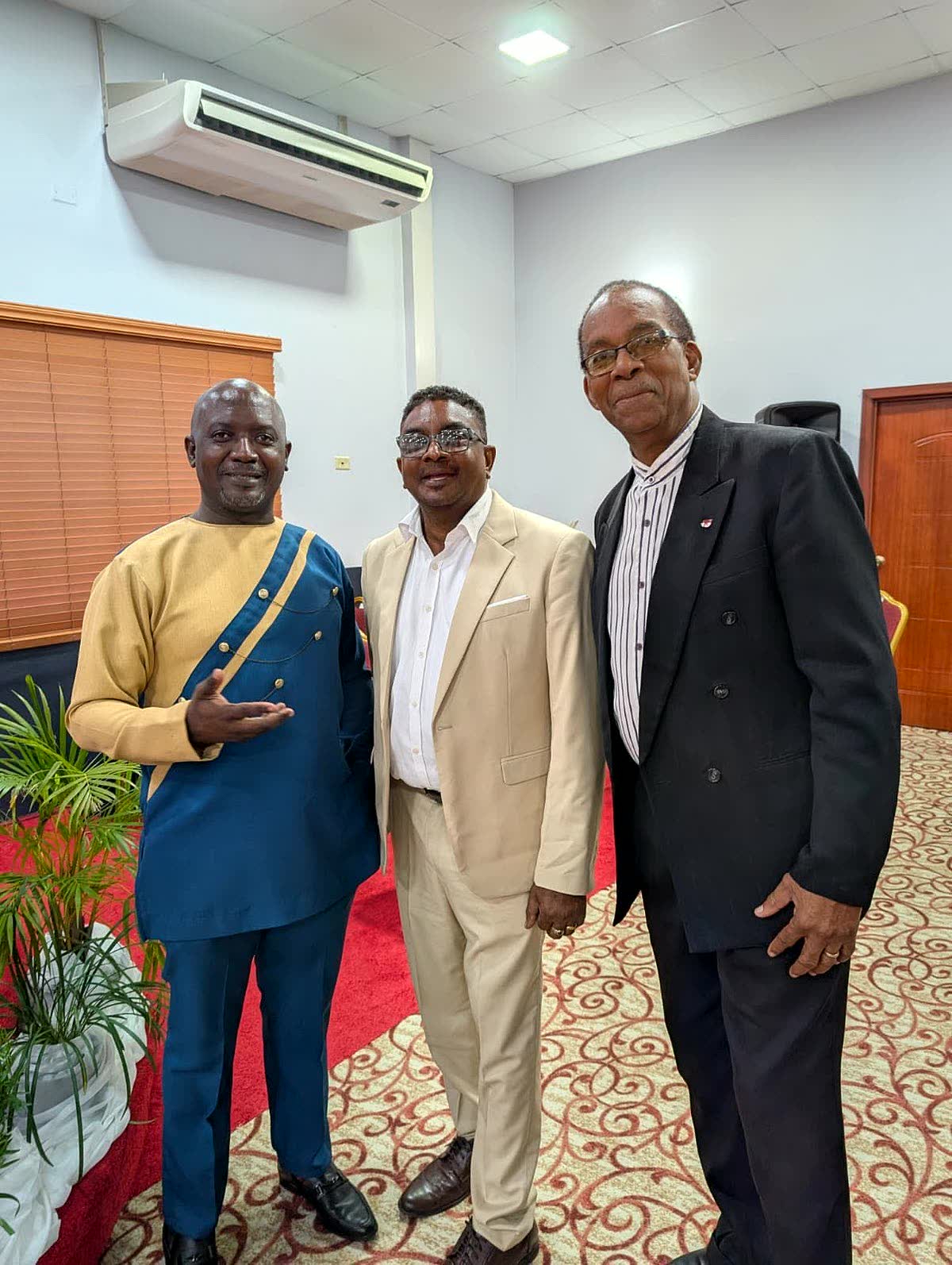 Apostle Lambert with leaders in Trinidad