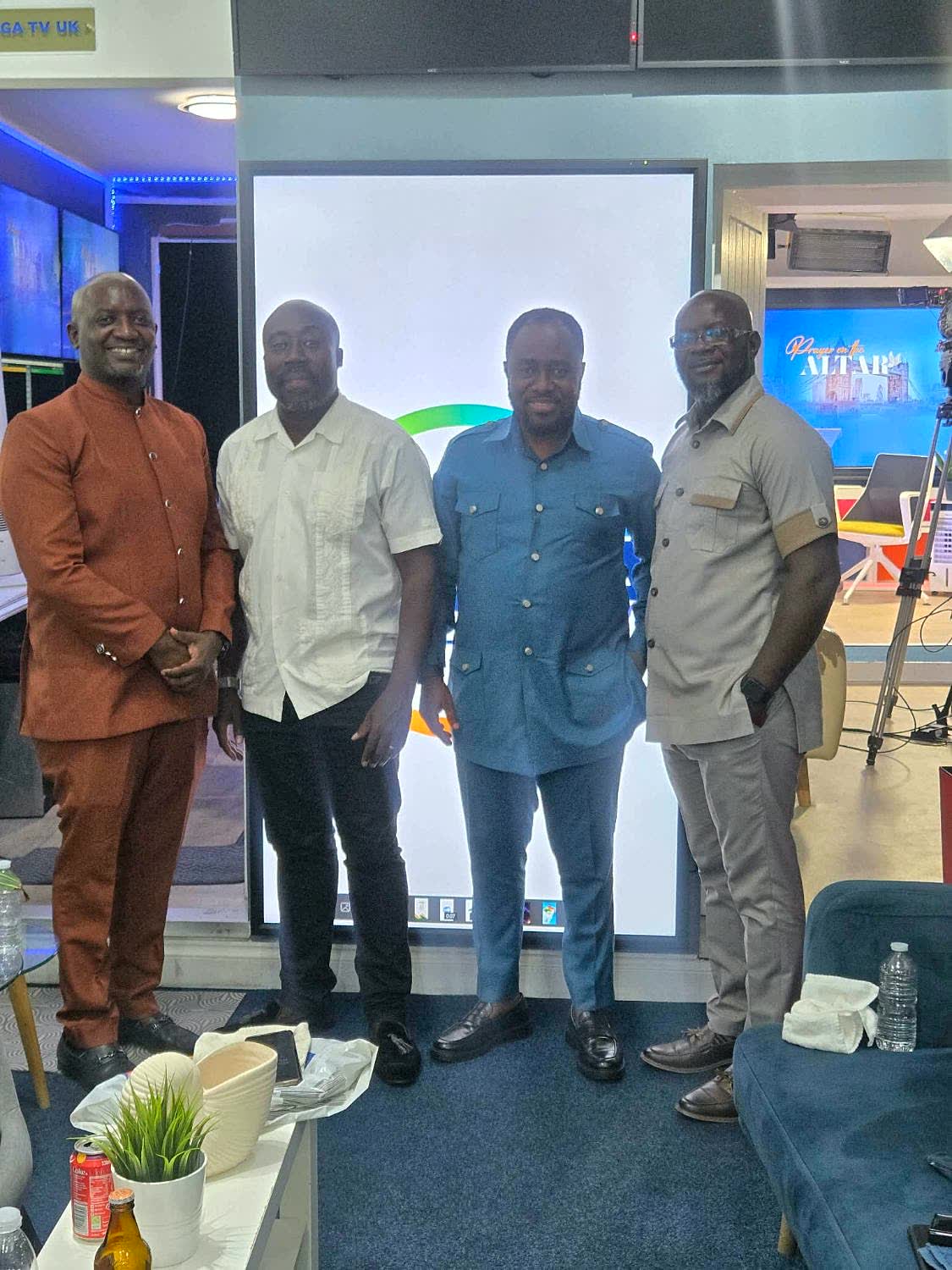 Apostle Lambert with ministers at the Omega TV UK studio